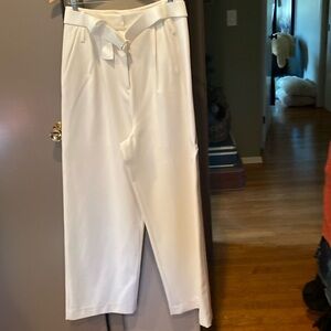 TIBI dress pants, size 4 eggshell color. PleaTed.flare/wide leg, belt.never worn